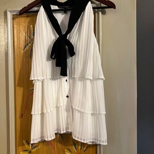 S12 layered sleeveless silk blouse with black buttons and tie. WHBM